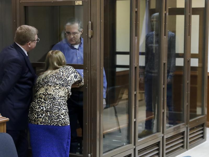Paul Whelan, a former U.S. Marine arrested in Moscow at the end of last year, looks through a cage's glass as he speaks to his lawyers in a court room in Moscow, Russia, at a January hearing. Paul Whelan, a former U.S. Marine arrested in Moscow at the end of last year, looks through a cage's glass as he speaks to his lawyers in a court room in Moscow, Russia, at a January hearing.