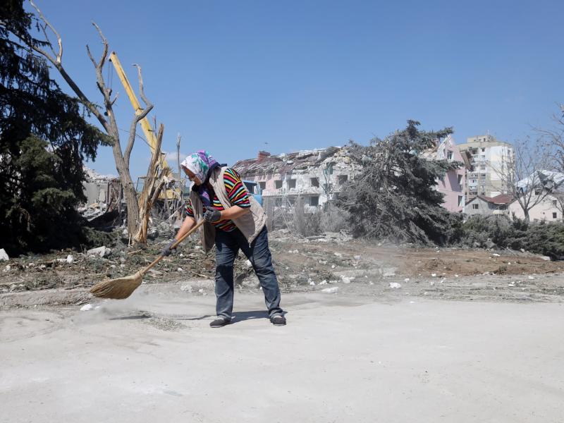 A woman cleans the area in front of a building hit by a missile strike in the Ukrainian town of Serhiivka, near Odesa, on Friday. The attack killed at least 18 people and injured 30. A woman cleans the area in front of a building hit by a missile strike in the Ukrainian town of Serhiivka, near Odesa, on Friday. The attack killed at least 18 people and injured 30.