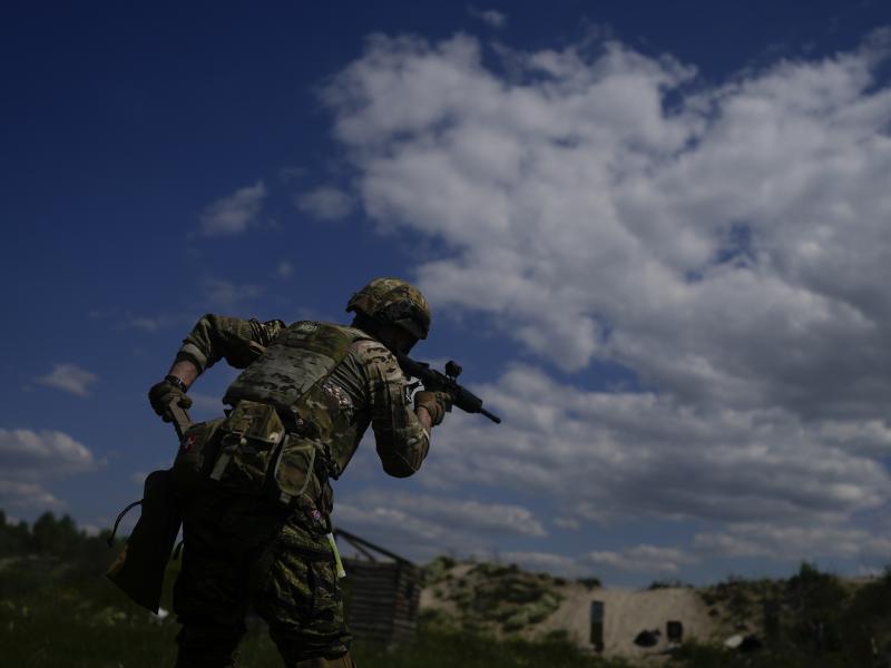 A civilian militia member holds a rifle during training at a shooting range on the outskirts of Kyiv on Tuesday. A civilian militia member holds a rifle during training at a shooting range on the outskirts of Kyiv on Tuesday.