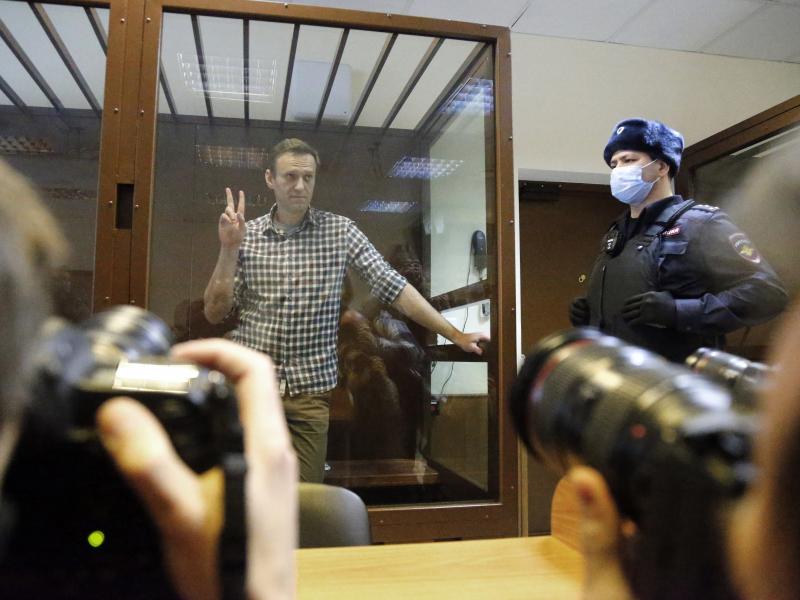 Russian opposition leader Alexei Navalny stands in a Moscow courtroom on Saturday. The court turned down an appeal against his prison sentence. Russian opposition leader Alexei Navalny stands in a Moscow courtroom on Saturday. The court turned down an appeal against his prison sentence.