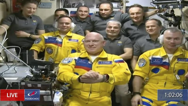 Russian cosmonauts (from left) Sergey Korsakov, Oleg Artemyev and Denis Matveev wear yellow at the International Space Station. Russian cosmonauts (from left) Sergey Korsakov, Oleg Artemyev and Denis Matveev wear yellow at the International Space Station.
