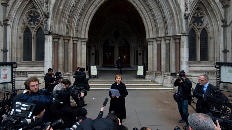 Marina Litvinenko, whose husband died in 2006 after being poisoned, spoke to the media after a British court issued a report saying Alexander Litvinenko had been murdered. Marina Litvinenko, whose husband died in 2006 after being poisoned, spoke to the media after a British court issued a report saying Alexander Litvinenko had been murdered.