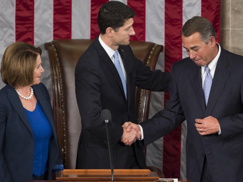 In 2015, newly elected Speaker of the House Paul Ryan shakes hands with outgoing Speaker John Boehner alongside House Democratic leader Nancy Pelosi at the U.S. Capitol. In 2015, newly elected Speaker of the House Paul Ryan shakes hands with outgoing Speaker John Boehner alongside House Democratic leader Nancy Pelosi at the U.S. Capitol.