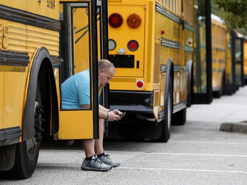Jay McAbee, a bus driver with the Greenville, S.C., school district, waits by his bus in Charleston, S.C., in October of 2016, for word of when to start evacuating the city's residents in advance of Hurricane Matthew. Simply having enough buses to carry p Jay McAbee, a bus driver with the Greenville, S.C., school district, waits by his bus in Charleston, S.C., in October of 2016, for word of when to start evacuating the city's residents in advance of Hurricane Matthew. Simply having enough buses to carry p
