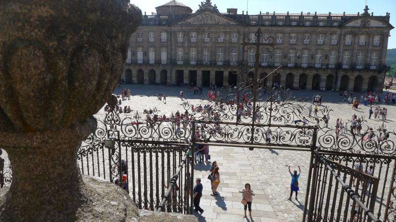 Hikers on the Camino de Santiago, Spain's most famous pilgrimage path, celebrate their journey's end in the plaza in front of the cathedral of Santiago de Compostela. Hikers on the Camino de Santiago, Spain's most famous pilgrimage path, celebrate their journey's end in the plaza in front of the cathedral of Santiago de Compostela.