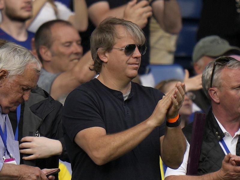 American businessman Todd Boehly, center, applauds as he attends the English Premier League soccer match between Chelsea and Watford at Stamford Bridge stadium in London, Sunday, May 22, 2022. American businessman Todd Boehly, center, applauds as he attends the English Premier League soccer match between Chelsea and Watford at Stamford Bridge stadium in London, Sunday, May 22, 2022.