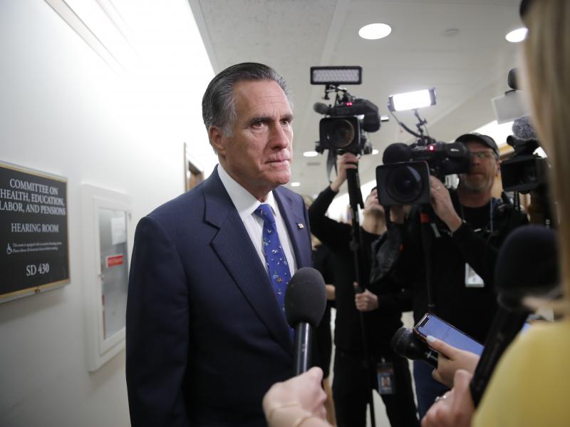 Sen. Mitt Romney, R-Utah, pauses to speak to media on Capitol Hill on Thursday. Romney is among the officials who criticized the flouting of airport guidelines for greeting returning missionaries. Sen. Mitt Romney, R-Utah, pauses to speak to media on Capitol Hill on Thursday. Romney is among the officials who criticized the flouting of airport guidelines for greeting returning missionaries.