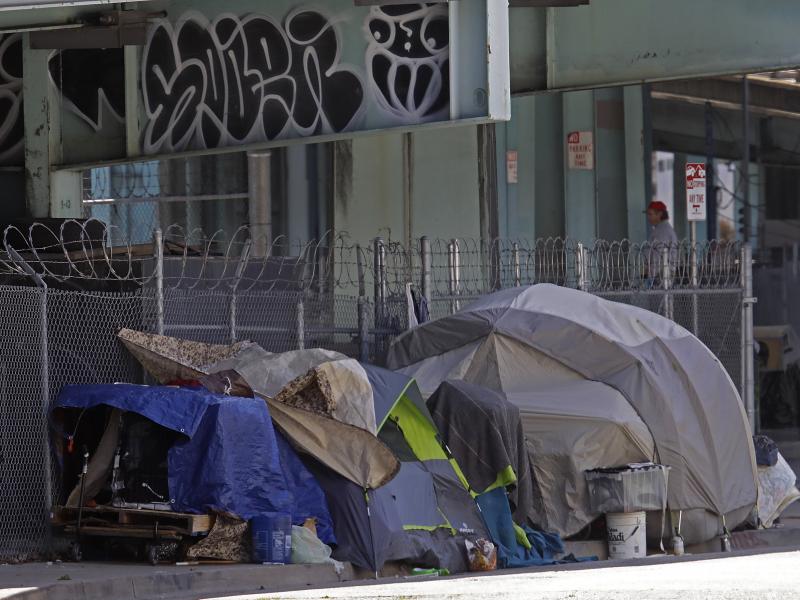 A homeless encampment seen on Monday in San Francisco. City lawmakers are demanding that the mayor step up efforts to house the city's homeless population to protect them from COVID-19. A homeless encampment seen on Monday in San Francisco. City lawmakers are demanding that the mayor step up efforts to house the city's homeless population to protect them from COVID-19.