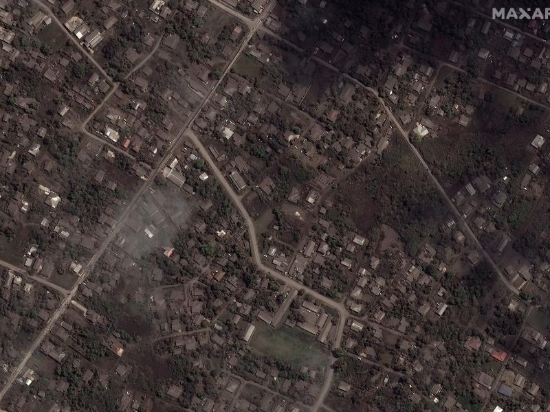 This satellite image provided shows ash covered homes and buildings in Tonga Tuesday, Jan. 18, 2022 days after a huge undersea volcanic eruption. This satellite image provided shows ash covered homes and buildings in Tonga Tuesday, Jan. 18, 2022 days after a huge undersea volcanic eruption.