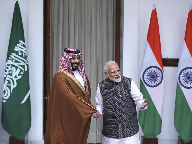 Indian Prime Minister Narendra Modi, right, shakes hands with Saudi Crown Prince Mohammed bin Salman before the start of their meeting in New Delhi, on Wednesday. Indian Prime Minister Narendra Modi, right, shakes hands with Saudi Crown Prince Mohammed bin Salman before the start of their meeting in New Delhi, on Wednesday.