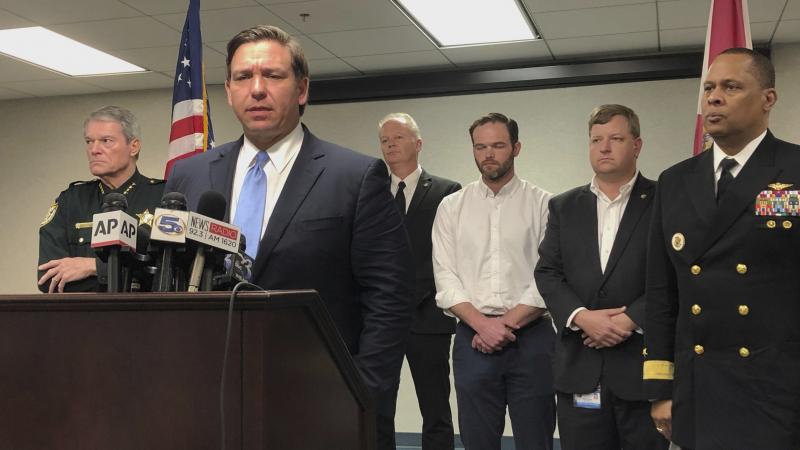 Florida Gov. Ron DeSantis says federal laws that allow foreign nationals to buy guns in the U.S. should be reviewed after a Saudi gunman carried out a mass shooting in Pensacola, Fla. DeSantis says, "The Second Amendment is so that we the American people Florida Gov. Ron DeSantis says federal laws that allow foreign nationals to buy guns in the U.S. should be reviewed after a Saudi gunman carried out a mass shooting in Pensacola, Fla. DeSantis says, "The Second Amendment is so that we the American people