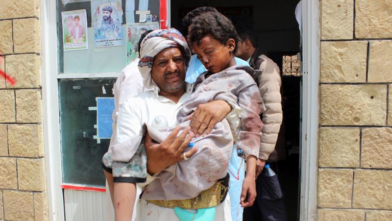 A man carries a wounded child to the hospital Thursday after the Saudi-led coalition carried out an airstrike on a crowded area in Houthi-controlled Saada province. At least 29 children under the age of 15 were killed in the attack, according to the Inter A man carries a wounded child to the hospital Thursday after the Saudi-led coalition carried out an airstrike on a crowded area in Houthi-controlled Saada province. At least 29 children under the age of 15 were killed in the attack, according to the Inter