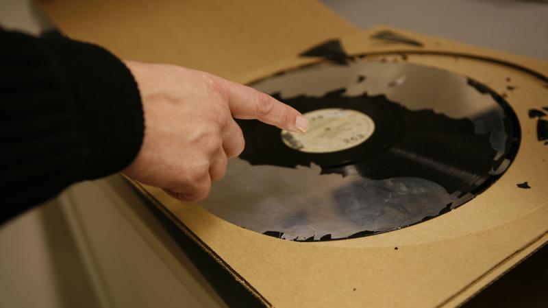 A 16-inch lacquer disc, a format used in the 1930s, from the collection of the Library of Congress. Most of the lacquer, the part of the disc where the sound was etched, has been lost to decay. A 16-inch lacquer disc, a format used in the 1930s, from the collection of the Library of Congress. Most of the lacquer, the part of the disc where the sound was etched, has been lost to decay.