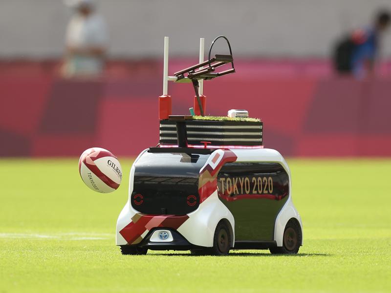 A Field Support Robot was used to retrieve rugby balls on day three of the Tokyo 2020 Olympic Games at Tokyo Stadium. Over the weekend, the FSR will help during track and field events. A Field Support Robot was used to retrieve rugby balls on day three of the Tokyo 2020 Olympic Games at Tokyo Stadium. Over the weekend, the FSR will help during track and field events.