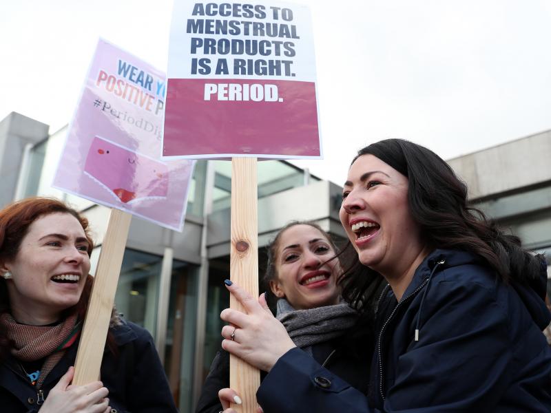 Scottish Parliament member Monica Lennon (right) joins supporters of the Period Products bill she sponsored, at a rally outside Parliament in Edinburgh on Tuesday. The legislation would make Scotland the first country in the world to make products like pa Scottish Parliament member Monica Lennon (right) joins supporters of the Period Products bill she sponsored, at a rally outside Parliament in Edinburgh on Tuesday. The legislation would make Scotland the first country in the world to make products like pa