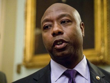 In a Nov. 16, 2016 file photo, Sen. Tim Scott, R-S.C., speaks to members of the media as he arrives for a closed-door Republican policy luncheon on Capitol Hill in Washington. In a Nov. 16, 2016 file photo, Sen. Tim Scott, R-S.C., speaks to members of the media as he arrives for a closed-door Republican policy luncheon on Capitol Hill in Washington.