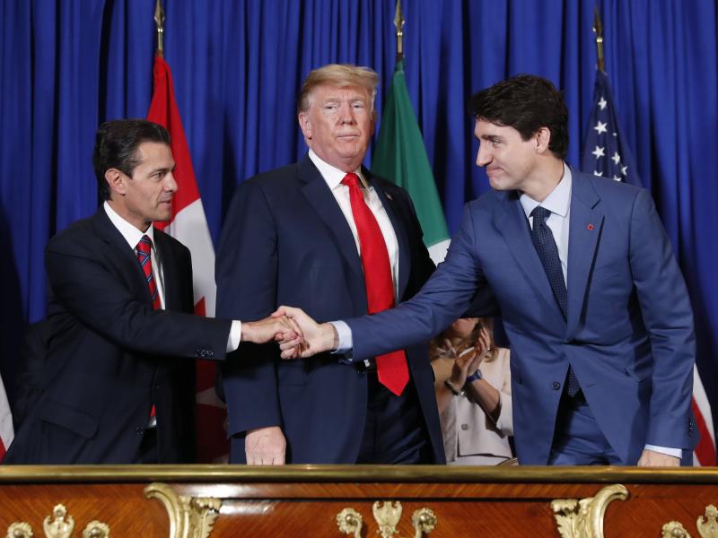 From left, then-Mexican President Enrique Peña Nieto, President Trump and Canadian Prime Minister Justin Trudeau participate in a USMCA signing ceremony in November 2018 in Buenos Aires, Argentina. From left, then-Mexican President Enrique Peña Nieto, President Trump and Canadian Prime Minister Justin Trudeau participate in a USMCA signing ceremony in November 2018 in Buenos Aires, Argentina.