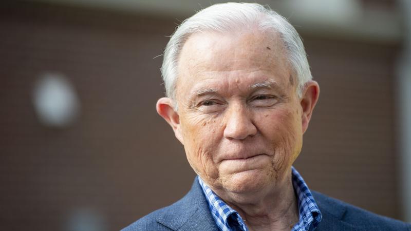 Jeff Sessions talks with the media after voting in Alabama's primary election in Mobile, Ala., on March 3. He faces Tommy Tuberville in Tuesday's Republican Senate runoff. Jeff Sessions talks with the media after voting in Alabama's primary election in Mobile, Ala., on March 3. He faces Tommy Tuberville in Tuesday's Republican Senate runoff.