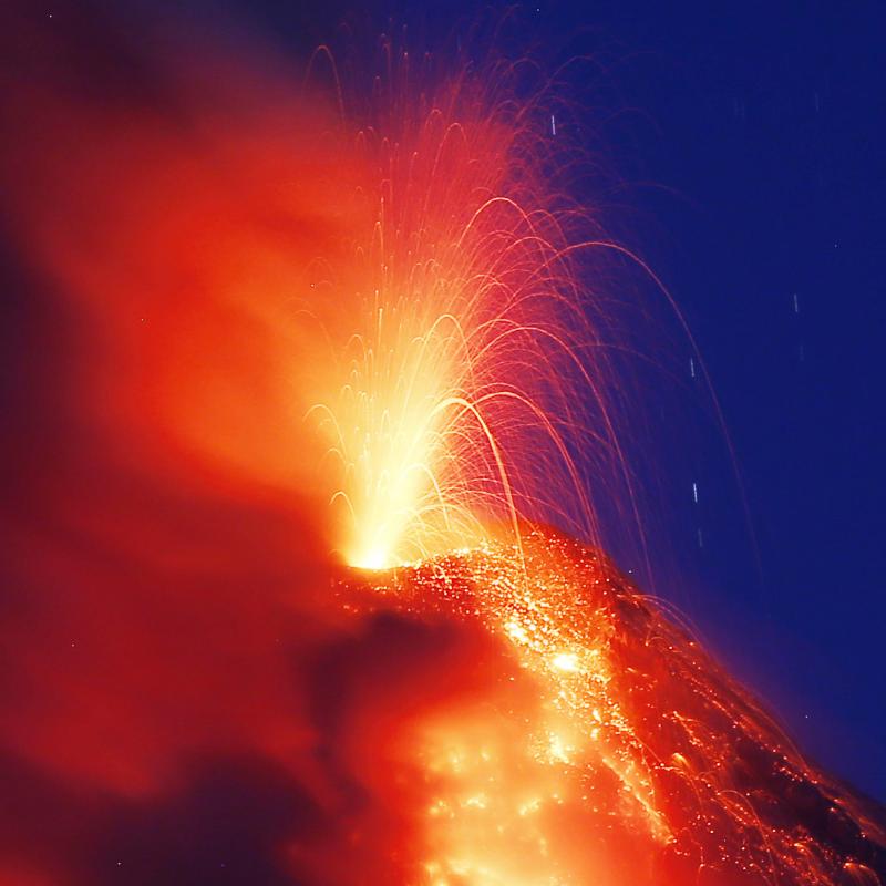 Mayon volcano erupts for the second straight day as lava cascades down its slopes on Tuesday, as seen from Legazpi city, Albay province. Mayon volcano erupts for the second straight day as lava cascades down its slopes on Tuesday, as seen from Legazpi city, Albay province.