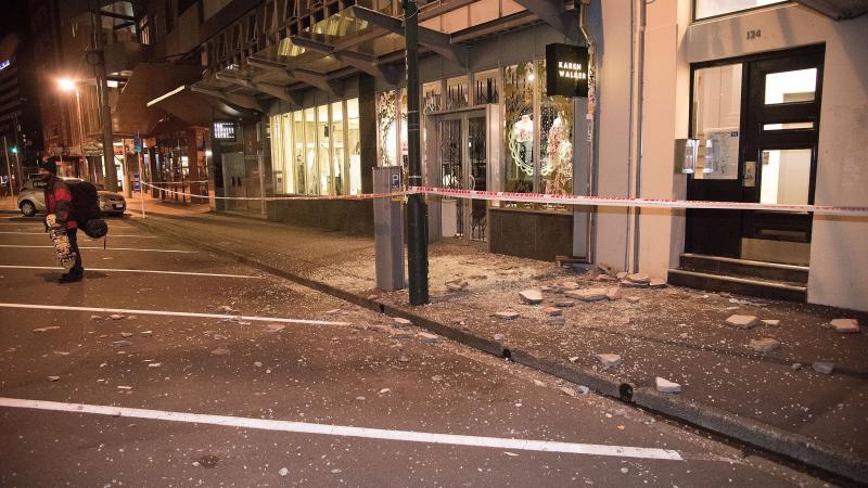 Debris from fallen concrete off buildings lies on the sidewalk in Wellington, after a powerful earthquake rocked New Zealand. The U.S. Geological Survey reports the quake had a 7.8 magnitude. Debris from fallen concrete off buildings lies on the sidewalk in Wellington, after a powerful earthquake rocked New Zealand. The U.S. Geological Survey reports the quake had a 7.8 magnitude.