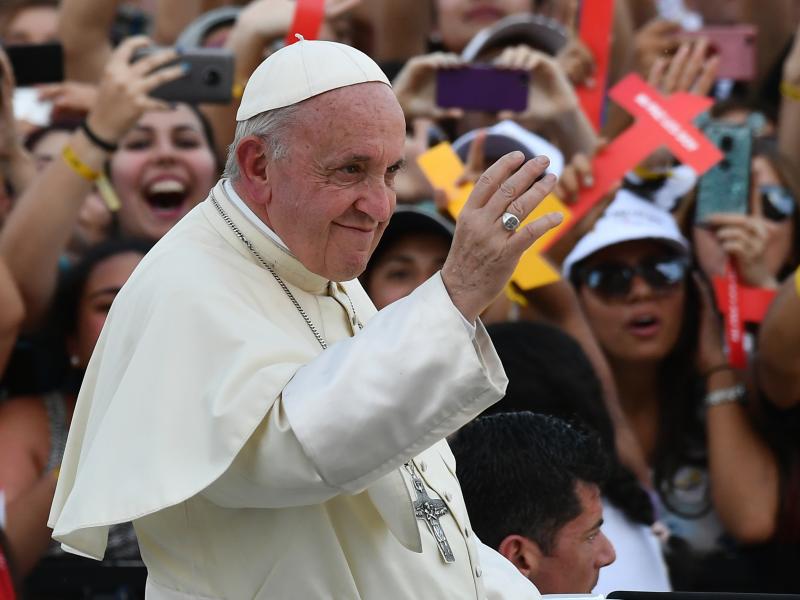Pope Francis waves to a crowd as he arrives at the National Shrine of Maipu in Santiago, Chile, to meet with young people, on Wednesday. Pope Francis waves to a crowd as he arrives at the National Shrine of Maipu in Santiago, Chile, to meet with young people, on Wednesday.