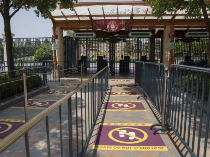 Visitors waiting in line at Shanghai Disneyland will need to maintain physical distancing as part of the theme park's plans to reopen on Monday. Visitors waiting in line at Shanghai Disneyland will need to maintain physical distancing as part of the theme park's plans to reopen on Monday.