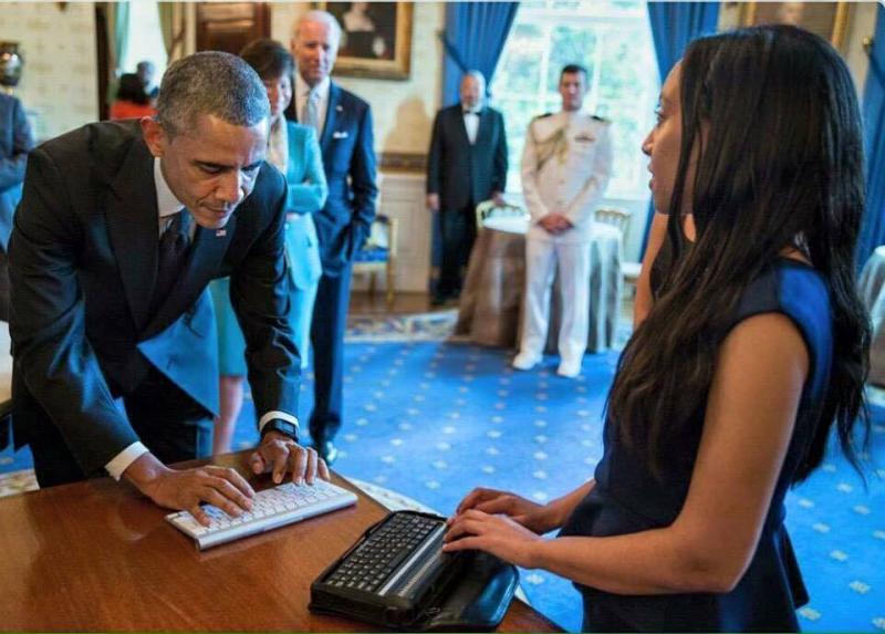 Using a digital device that displays Braille characters, Haben Girma talks with President Obama at a White House ceremony marking the 25th anniversary of the Americans with Disabilities Act. Using a digital device that displays Braille characters, Haben Girma talks with President Obama at a White House ceremony marking the 25th anniversary of the Americans with Disabilities Act.