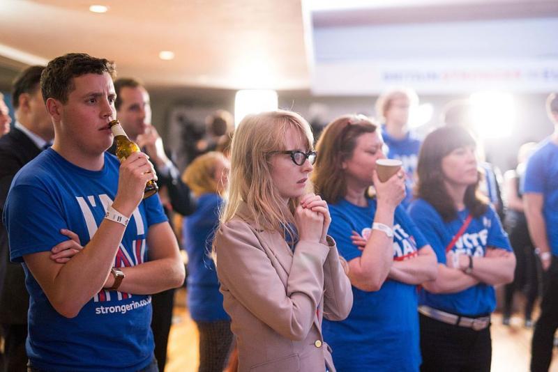 Supporters of the 'Stronger In' Campaign watch the results of the EU referendum being announced at a results party at the Royal Festival Hall in London on Friday. Supporters of the 'Stronger In' Campaign watch the results of the EU referendum being announced at a results party at the Royal Festival Hall in London on Friday.