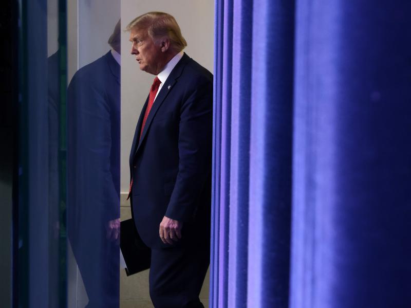 President Trump walks up to speak during a news conference Monday, minutes before being interrupted by news of a shooting outside the White House. President Trump walks up to speak during a news conference Monday, minutes before being interrupted by news of a shooting outside the White House.