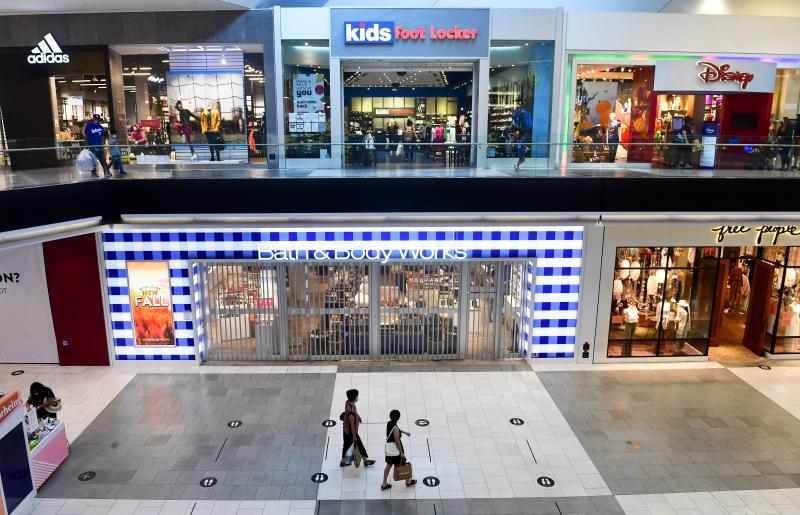 Shoppers stroll through the newly reopened Westfield Santa Anita mall in Arcadia, Calif., on Oct. 7. Shoppers stroll through the newly reopened Westfield Santa Anita mall in Arcadia, Calif., on Oct. 7.
