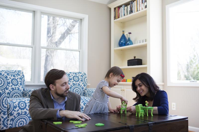 Travis and Sadiye Rieder play with Sinem in their home. They've agreed that if they want more children, they'll adopt. Travis and Sadiye Rieder play with Sinem in their home. They've agreed that if they want more children, they'll adopt.