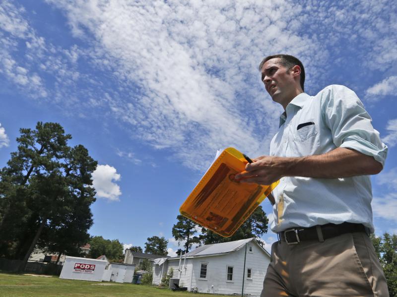 Democratic candidate for the Virginia House of Delegates, Schuyler VanValkenburg canvasses a street last month in Henrico, Va. VanValkenburg is part of a surge of Democratic candidates running in Virginia this fall. Democratic candidate for the Virginia House of Delegates, Schuyler VanValkenburg canvasses a street last month in Henrico, Va. VanValkenburg is part of a surge of Democratic candidates running in Virginia this fall.