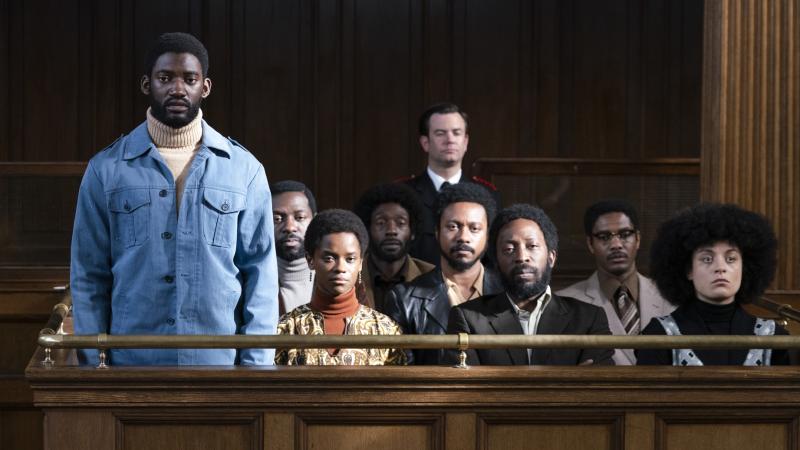 Malachi Kirby (standing) plays activist Darcus Howe in Mangrove, the first film in Steve McQueen's Small Axe anthology. Malachi Kirby (standing) plays activist Darcus Howe in Mangrove, the first film in Steve McQueen's Small Axe anthology.