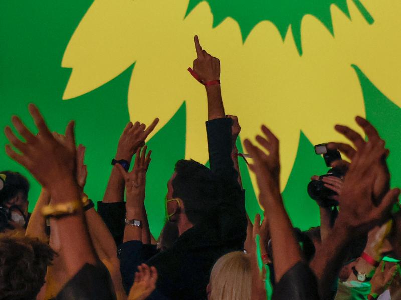 Supporters of Germany's Green Party celebrate after estimates were broadcast on television in Berlin at their electoral party on Sunday after the German general elections. Supporters of Germany's Green Party celebrate after estimates were broadcast on television in Berlin at their electoral party on Sunday after the German general elections.
