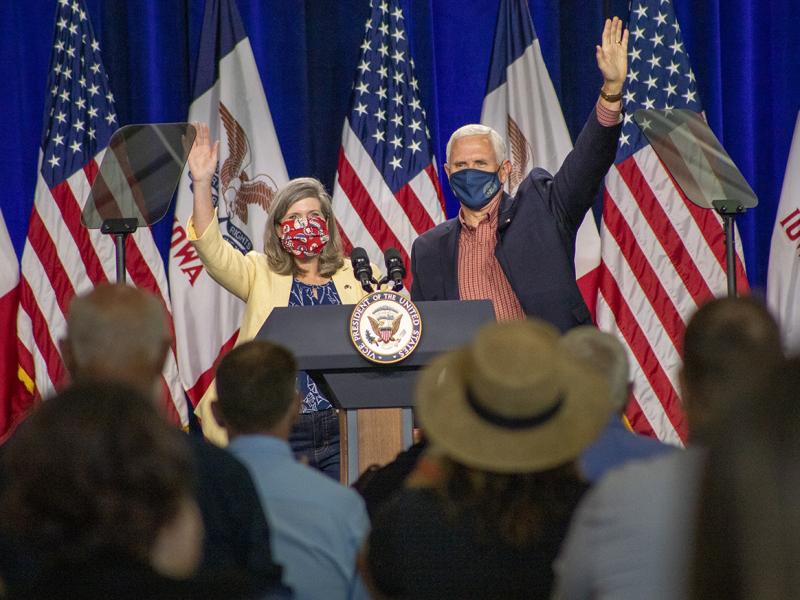 U.S. Sen. Joni Ernst, R-Iowa, appears on stage with Vice President Mike Pence in Des Moines on Aug. 13. Ernst is locked in a close race for reelection this fall against Democrat Theresa Greenfield. U.S. Sen. Joni Ernst, R-Iowa, appears on stage with Vice President Mike Pence in Des Moines on Aug. 13. Ernst is locked in a close race for reelection this fall against Democrat Theresa Greenfield.