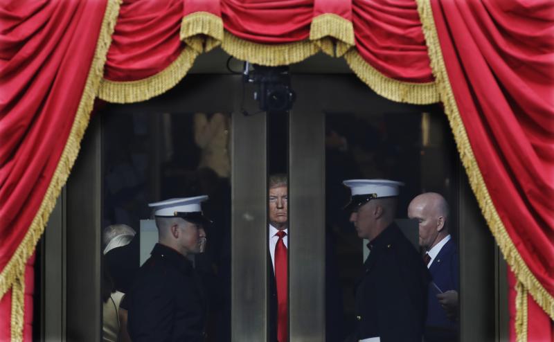 Donald Trump waits to step onto the portico for his presidential inauguration on Jan. 20. Donald Trump waits to step onto the portico for his presidential inauguration on Jan. 20.