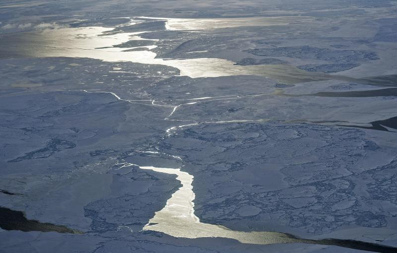 Sea ice is seen from NASA's Operation IceBridge research aircraft off the northwest coast of Greenland on March 30, 2017. Sea ice is seen from NASA's Operation IceBridge research aircraft off the northwest coast of Greenland on March 30, 2017.