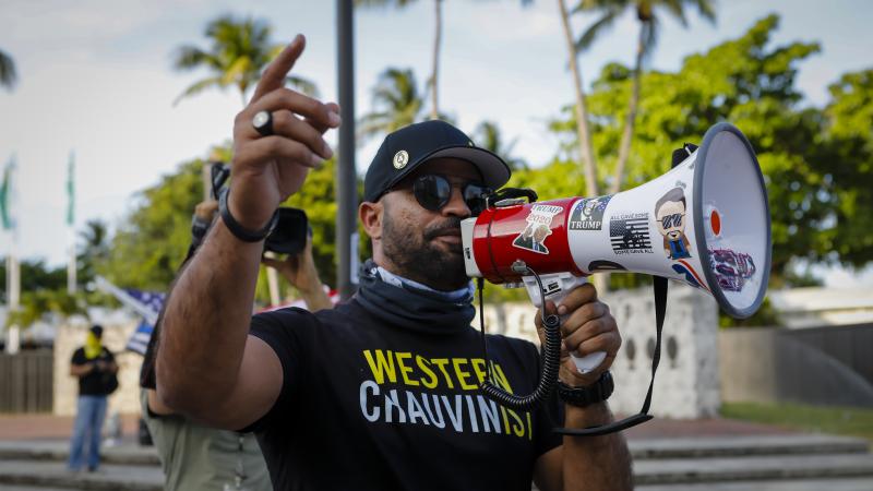 "My goal for this year ... was simple," Proud Boys Chairman Enrique Tarrio tells NPR. "Start getting more involved in local politics." "My goal for this year ... was simple," Proud Boys Chairman Enrique Tarrio tells NPR. "Start getting more involved in local politics."