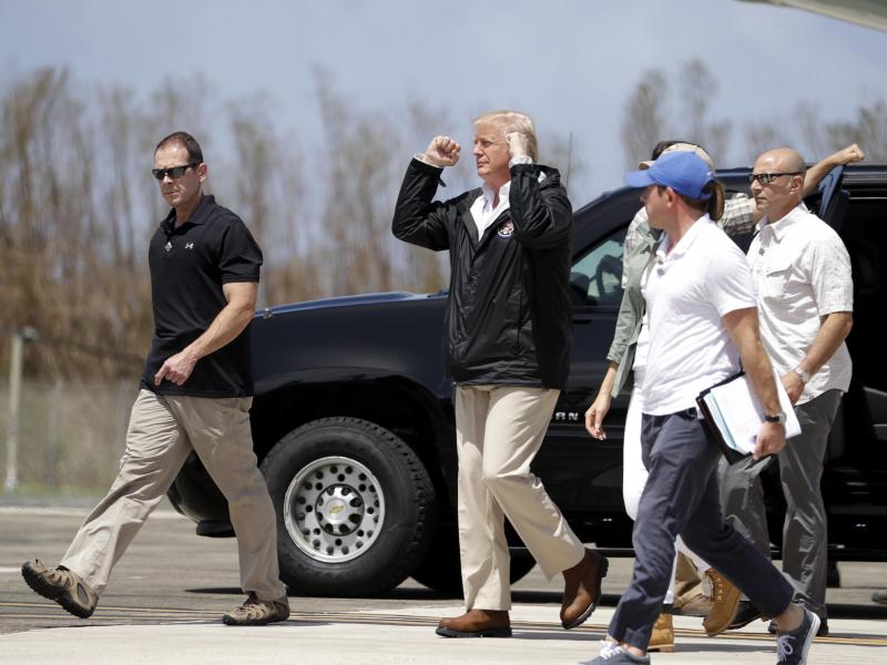 President Trump arrives at the Luis Muñiz Air National Guard Base in San Juan, Puerto Rico, on Tuesday. President Trump arrives at the Luis Muñiz Air National Guard Base in San Juan, Puerto Rico, on Tuesday.