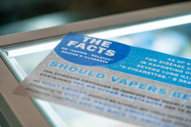 A flyer reminding customers about vaping-related deaths and illnesses, on display in a Seattle vape store. The Washington State Board of Health recently passed a four-month emergency ban on flavored vaping products. It applies to products that contain eit A flyer reminding customers about vaping-related deaths and illnesses, on display in a Seattle vape store. The Washington State Board of Health recently passed a four-month emergency ban on flavored vaping products. It applies to products that contain eit