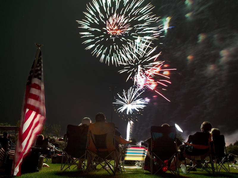 Spectators watch as fireworks explode overhead during the Fourth of July celebration at Pioneer Park, on July 4, 2013, in Prescott, Ariz. Spectators watch as fireworks explode overhead during the Fourth of July celebration at Pioneer Park, on July 4, 2013, in Prescott, Ariz.