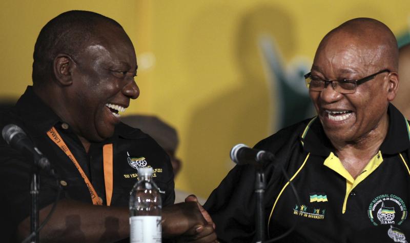 South African President Jacob Zuma (right) shares a laugh with Cyril Ramaphosa in Bloemfontein, South Africa, in 2012. Zuma resigned Wednesday and is widely expected to be replaced by Ramaphosa. South African President Jacob Zuma (right) shares a laugh with Cyril Ramaphosa in Bloemfontein, South Africa, in 2012. Zuma resigned Wednesday and is widely expected to be replaced by Ramaphosa.