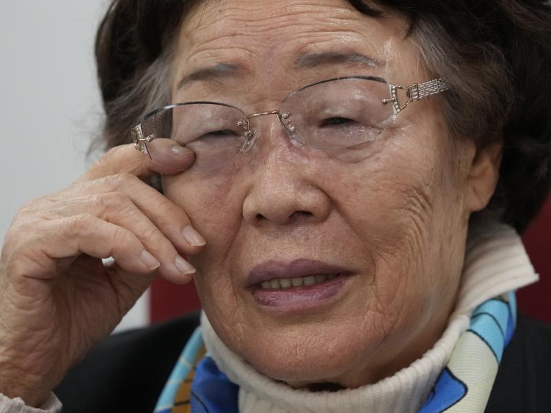 Lee Yong-soo, a South Korean sexual slavery survivor who has been demanding since the early 1990s that the Japanese government fully accept culpability and offer an unequivocal apology, wipes her tear during an interview in Seoul, South Korea, on March 16 Lee Yong-soo, a South Korean sexual slavery survivor who has been demanding since the early 1990s that the Japanese government fully accept culpability and offer an unequivocal apology, wipes her tear during an interview in Seoul, South Korea, on March 16