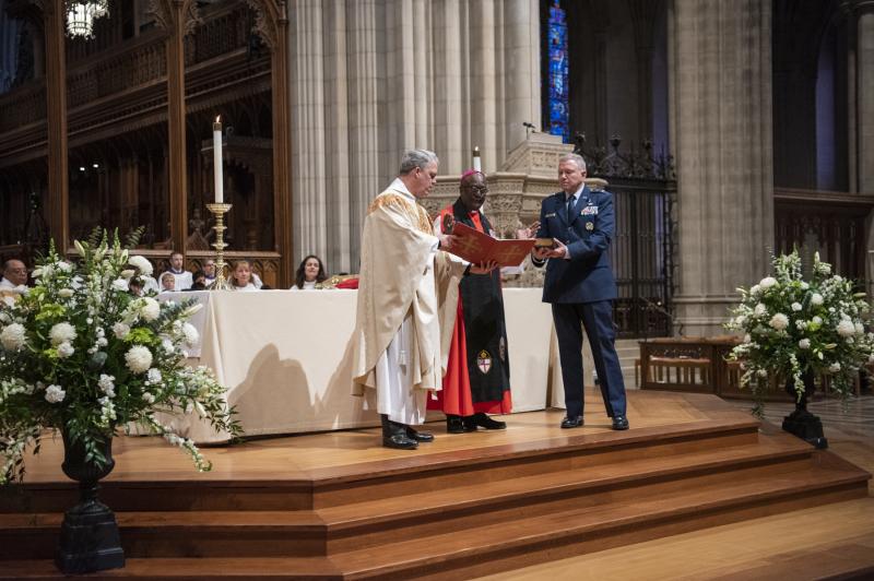 The Rev. Randolph Hollerith, dean of the Washington National Cathedral (from left); the Rev. Carl Wright, the Episcopal Church's bishop suffragan for the armed forces; and Maj. Gen. Steven Schaick, the Air Force chief of chaplains, participate in the bles The Rev. Randolph Hollerith, dean of the Washington National Cathedral (from left); the Rev. Carl Wright, the Episcopal Church's bishop suffragan for the armed forces; and Maj. Gen. Steven Schaick, the Air Force chief of chaplains, participate in the bles