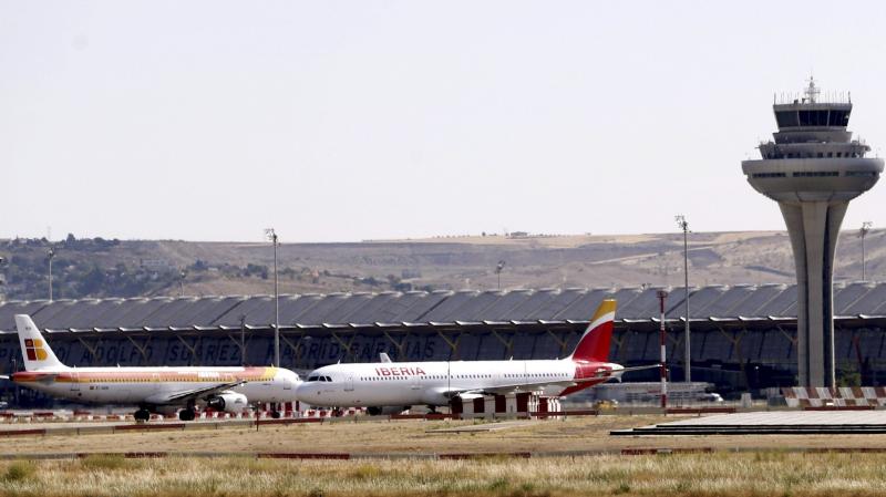 Two Spanish Iberia airplanes stand on the tarmac at the Adolfo Suarez Madrid-Barajas airport in Madrid on Monday. Spanish air traffic controllers started a four-day partial strike that could affect some 5,300 flights. Two Spanish Iberia airplanes stand on the tarmac at the Adolfo Suarez Madrid-Barajas airport in Madrid on Monday. Spanish air traffic controllers started a four-day partial strike that could affect some 5,300 flights.