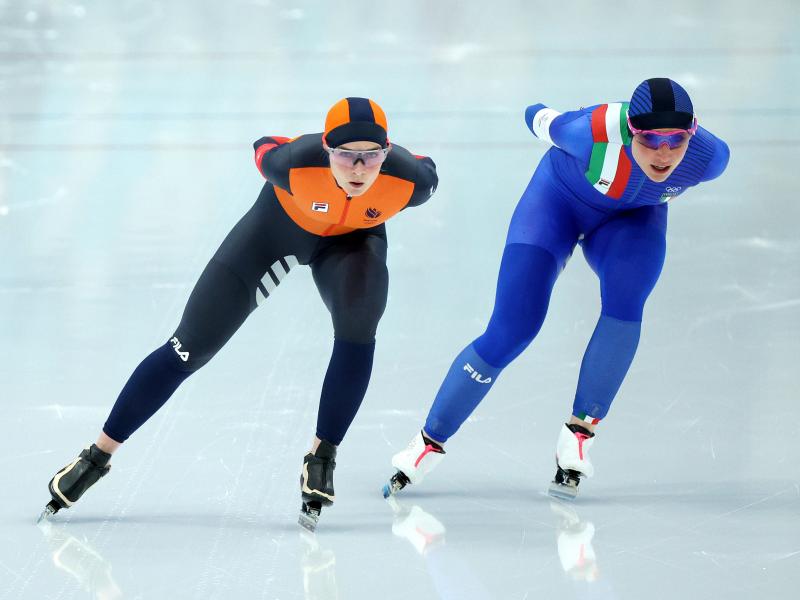 Irene Schouten of Team Netherlands skates ahead of Francesca Lollobrigida of Team Italy during the Women's 3000m on day one of the Beijing 2022 Winter Olympic Games at National Speed Skating Oval. Irene Schouten of Team Netherlands skates ahead of Francesca Lollobrigida of Team Italy during the Women's 3000m on day one of the Beijing 2022 Winter Olympic Games at National Speed Skating Oval.