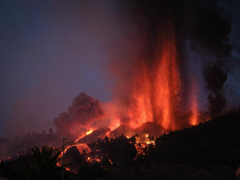 Cumbre Vieja erupts, spewing out columns of smoke, ash and lava, as seen from Los Llanos de Aridane municipality on the Canary island of La Palma on Sunday. Cumbre Vieja erupts, spewing out columns of smoke, ash and lava, as seen from Los Llanos de Aridane municipality on the Canary island of La Palma on Sunday.