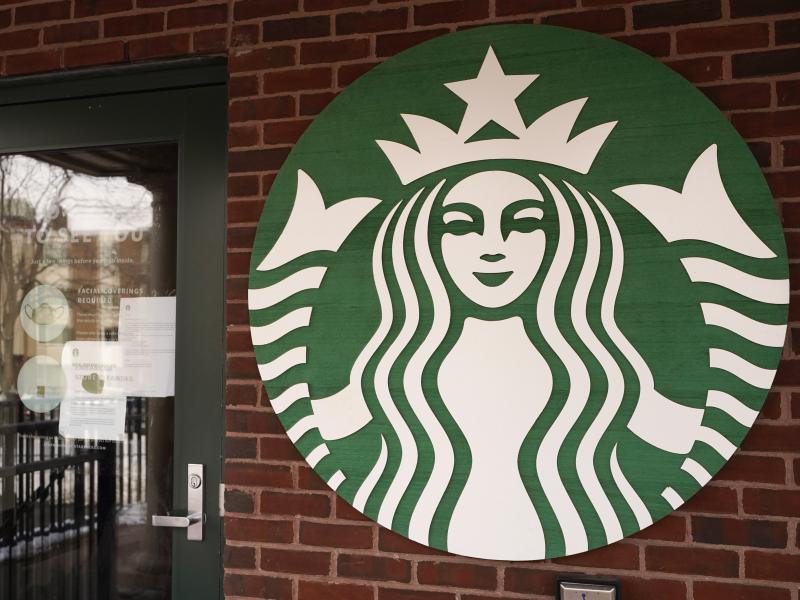 A Starbucks company logo are seen in Palatine, Ill. A Starbucks company logo are seen in Palatine, Ill.