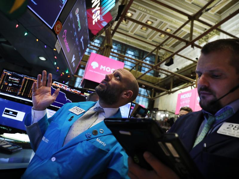 Traders work on the floor of the New York Stock Exchange on Thursday. Stocks plunged for the second trading day in a row but recovered late in the day. Traders work on the floor of the New York Stock Exchange on Thursday. Stocks plunged for the second trading day in a row but recovered late in the day.