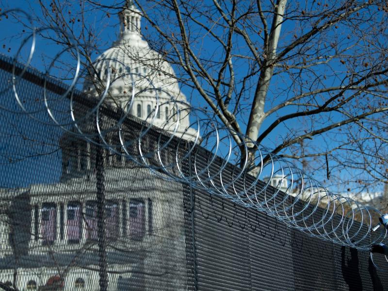 Enhanced security measures, among them razor wire atop a security fence surrounding the U.S. Capitol, are being implemented across the nation in preparation for next week's presidential inauguration. Enhanced security measures, among them razor wire atop a security fence surrounding the U.S. Capitol, are being implemented across the nation in preparation for next week's presidential inauguration.